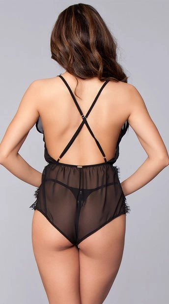 Elegant black romper with plunging neckline and sheer lace details, perfect for evening or intimate wear